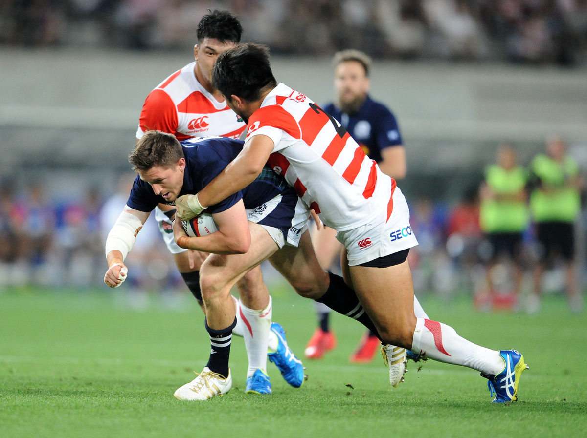 Henry Pyrgos - Scotland captain is hauled down by Shota Horie - Japan captain and hooker. Japan v Scotland, Ajinomoto Stadium, Tokyo, Japan, Saturday 25 June 2016. ***Please credit: David Gibson/Fotosport***